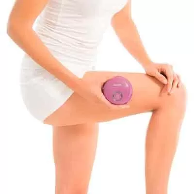 Image of a woman using Beurer FC 55 without handle attached 