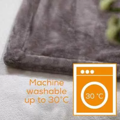 Image of a Beurer HD 75 indicating machine wash at 30 degrees C