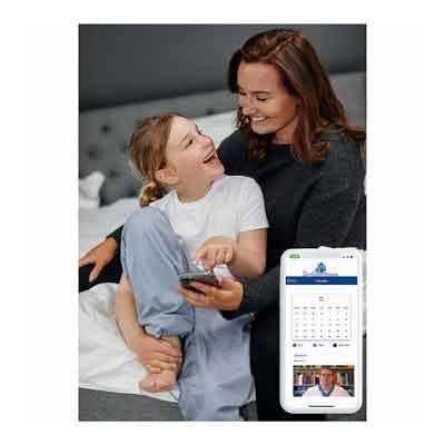 Image of a girl and mum with phone and DryGuardians app