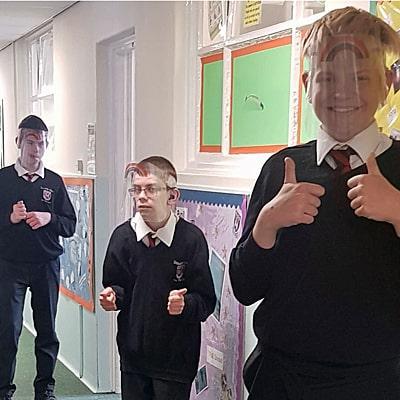 Image of deaf children wearing Kidsafe Visors at school for deaf children