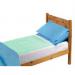 Image of green Drytex bed pad on a bed