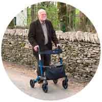 Image of a man with rollator and walker